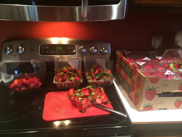 Prepping strawberries for freezing may be a hassle but it is worth it!