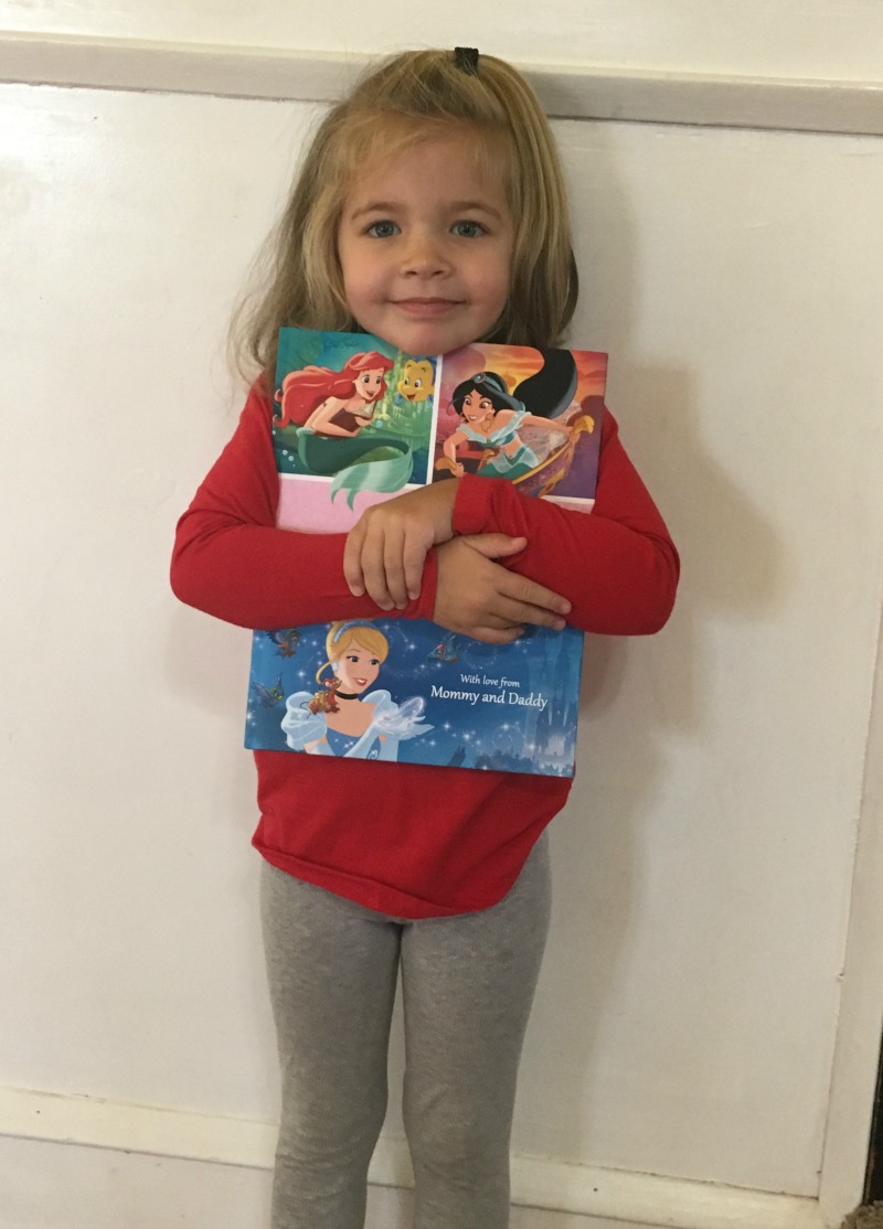 She loves her Dream Big Disney Princess Personalized Book!